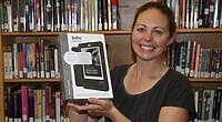 20111002111427librarydirectorerincomeauwithkoboereader1024x6821