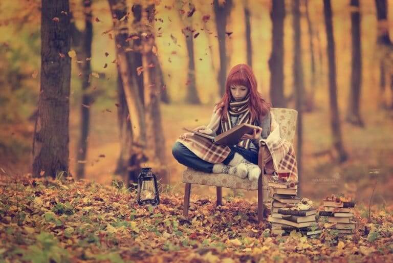 girl reading in fall woods 1024x685 1 768x514 2