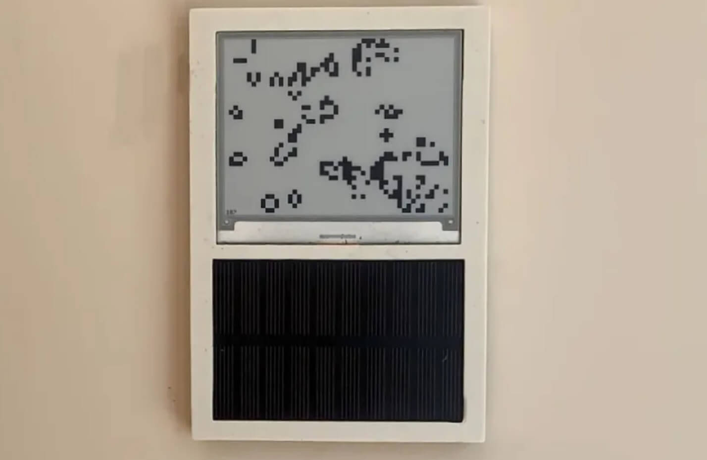solar powered e ink device game of life