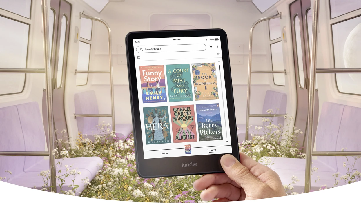 ahandholdsthekindlecolorsoftinasubwaytrain
